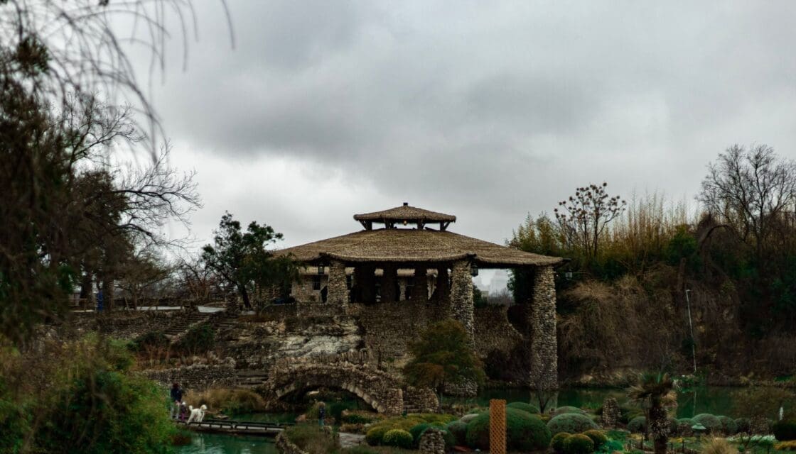 San Antonio with kids — Japanese Tea Garden stone bridge and koi pond in Brackenridge Park