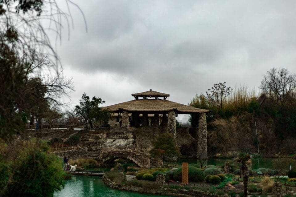 San Antonio with kids — Japanese Tea Garden stone bridge and koi pond in Brackenridge Park